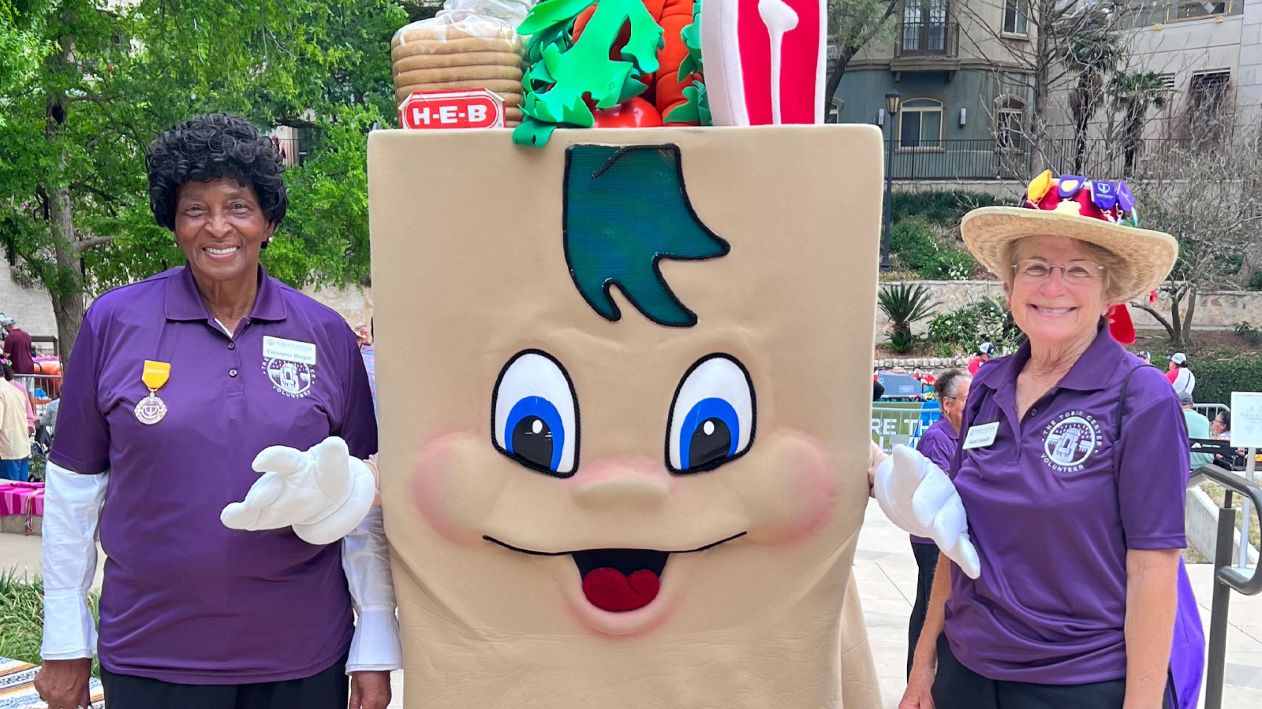 Tobin Center Volunteers with HEB Mascot 